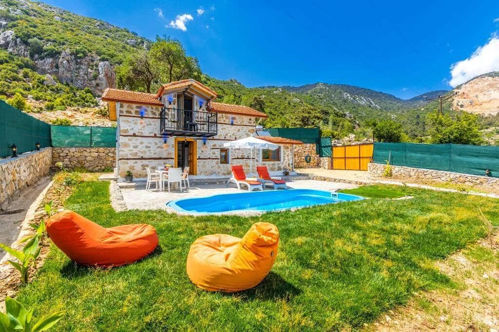 Kalkan İkizce'de Taş Mimarili, Özel Havuzlu, Geniş Bahçeli Villa görsel 1