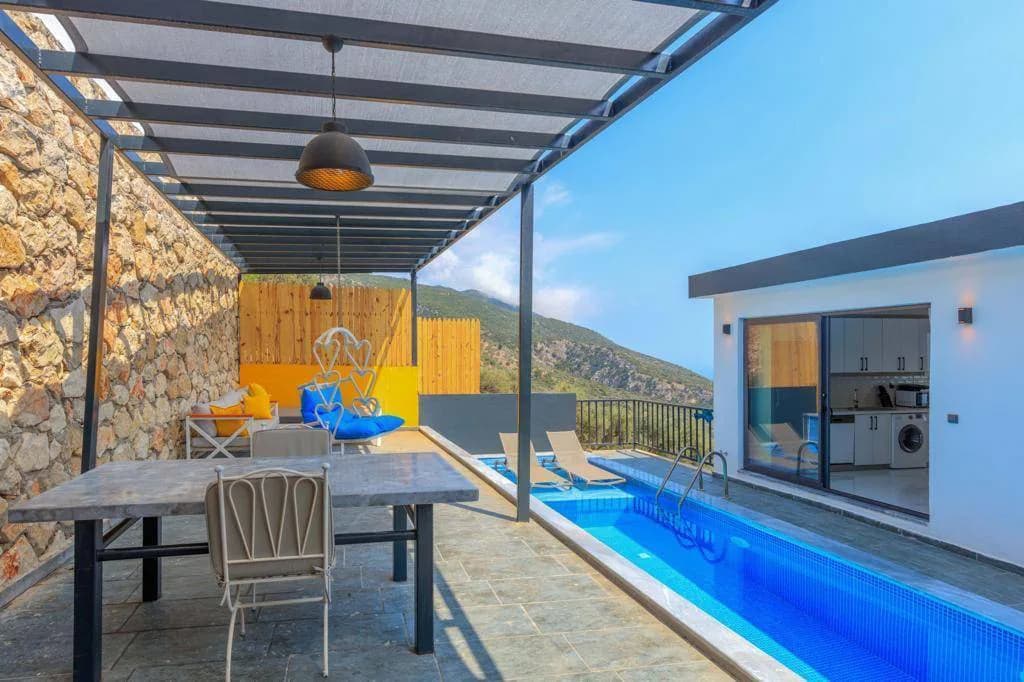 Kaş Bezirgan'da Adalar Manzaralı, Özel Havuzlu, Kiralık Balayı Villası görsel 1