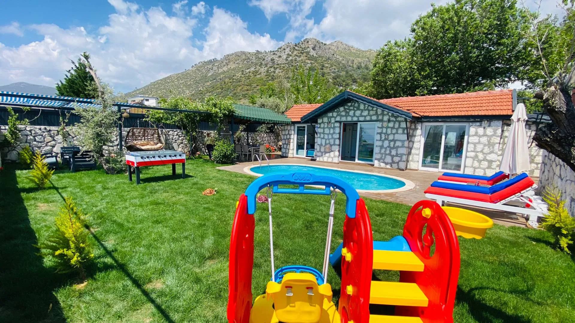Kaş Üzümlü'de Taş Mimarili, Özel Havuzlu, Çocuk Oyun Alanlı Villa görsel 3