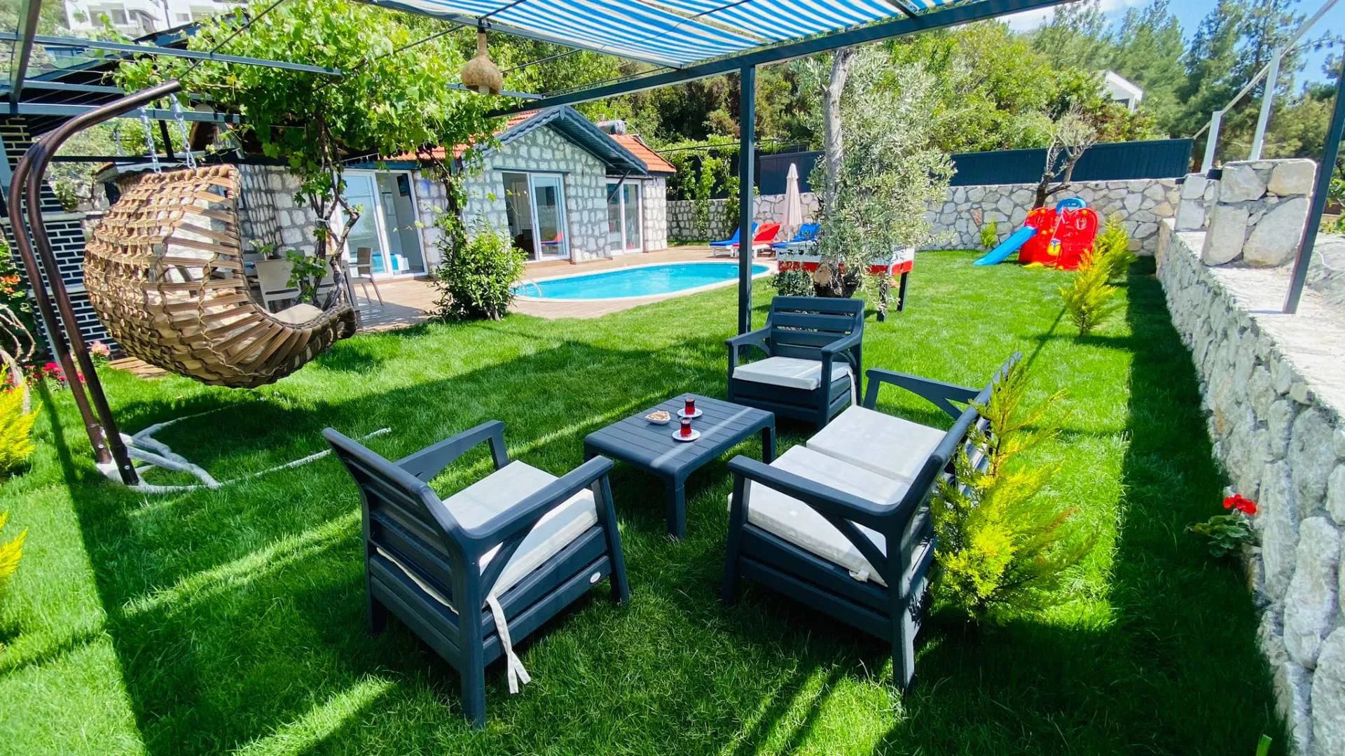 Kaş Üzümlü'de Taş Mimarili, Özel Havuzlu, Çocuk Oyun Alanlı Villa görsel 1
