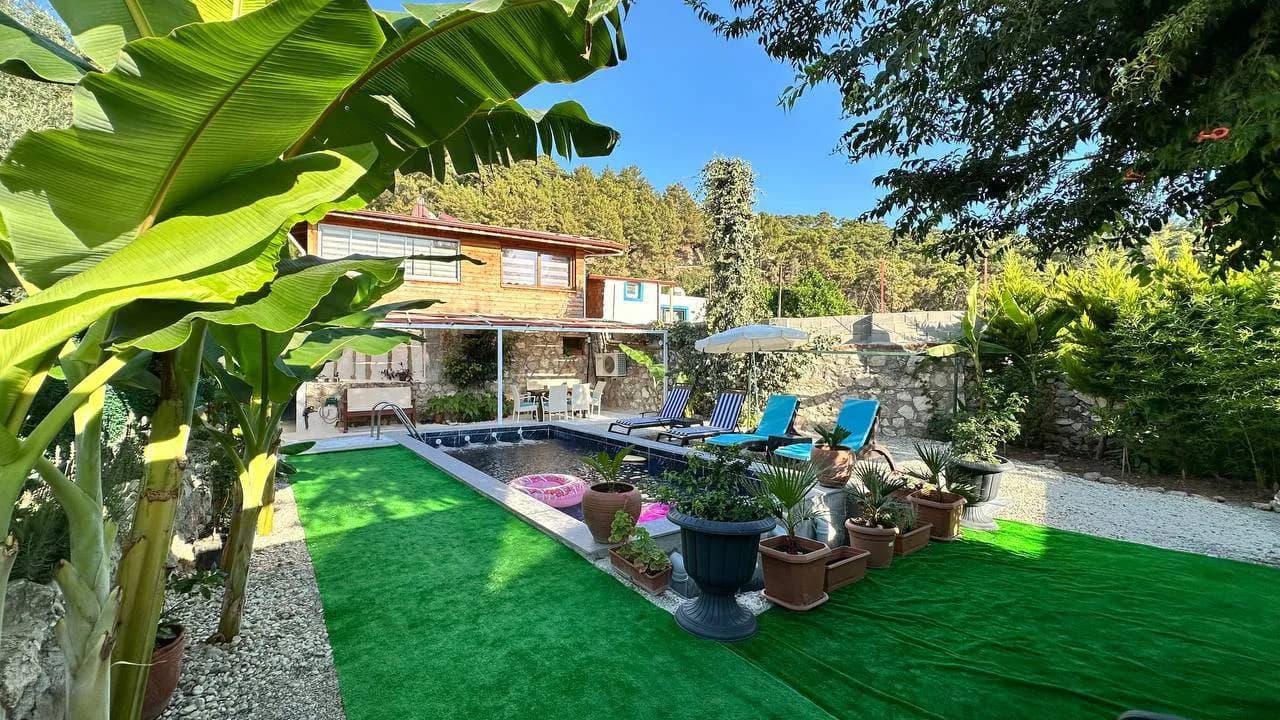 Fethiye Faralya'da Yeşillikler İçerisinde, deniz manzaralı,Isıtmalı Havuzlu, çift havuzlu Villa görsel 2