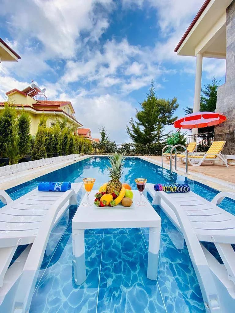Fethiye Ölüdeniz'de Site İçerisinde, Ortak ve Özel Havuzlu, Kiralık Villa görsel 2